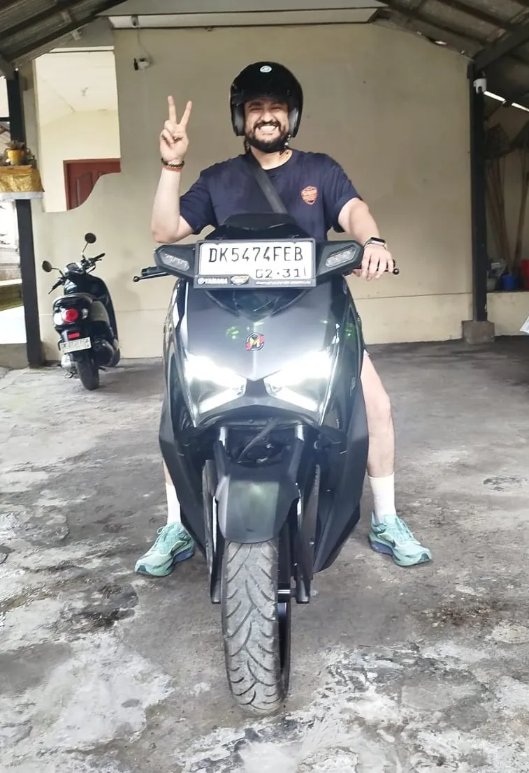 Customer with a scooter in Bali